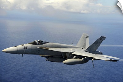 An F/A-18E Super Hornet over the Pacific Ocean
