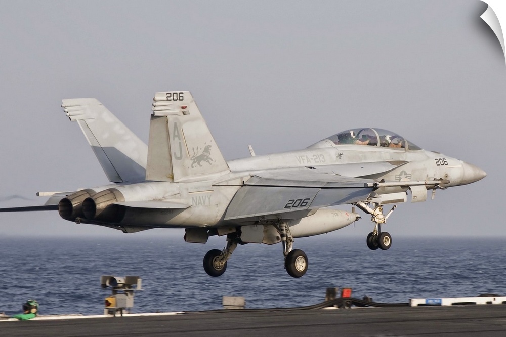 Persian Gulf, October 30, 2011 - An F/A-18F Super Hornet takes off from the flight deck of USS George H.W. Bush.