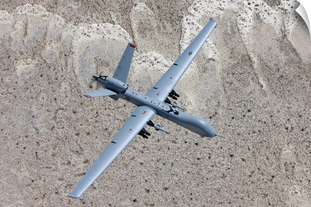 An MQ-9 Reaper flies a training mission over the White Sands National Monument in Southern New Mexico.