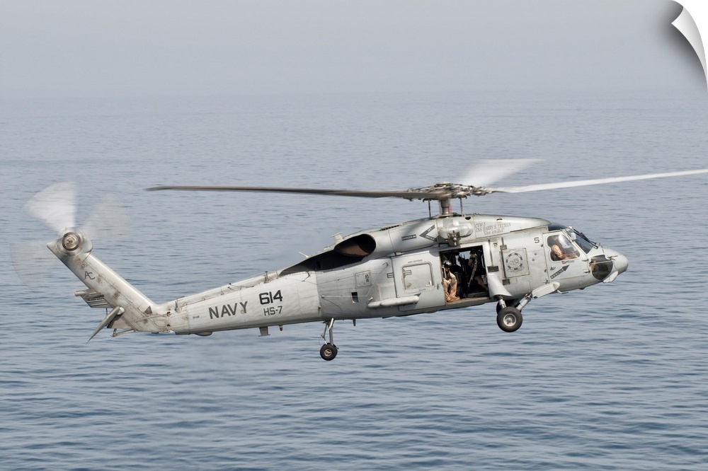 An SH-60F Seahawk gets airborne from the deck of USS Harry S. Truman. Truman is deployed in support of maritime security o...