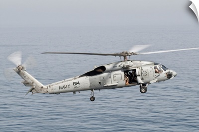 An SH-60F Seahawk gets airborne from the deck of USS Harry S. Truman