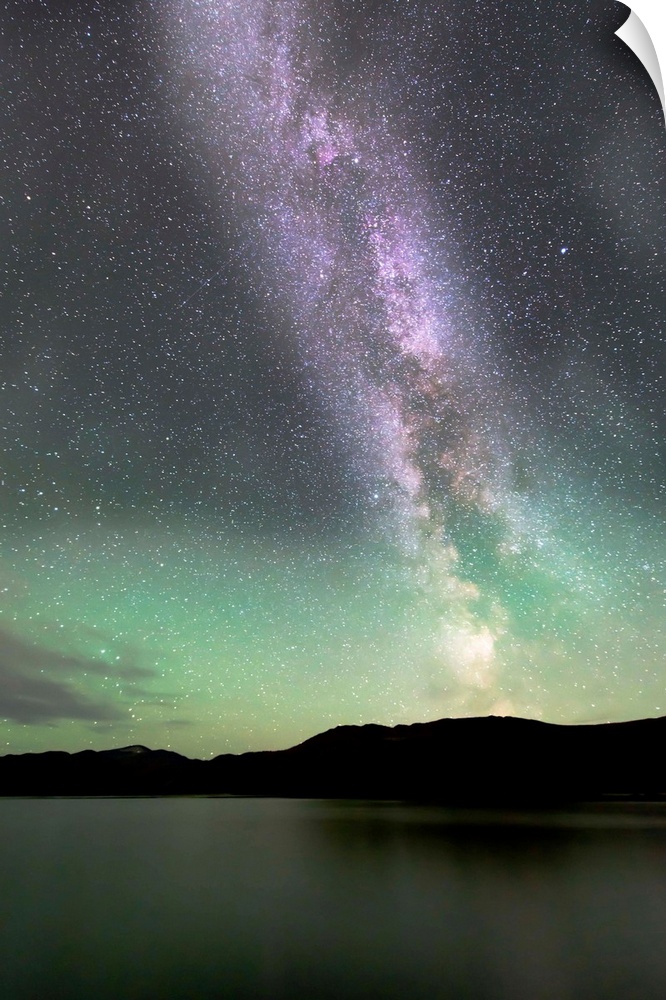 Aurora borealis and Milky Way above Fish Lake, Whitehorse, Yukon, Canada.