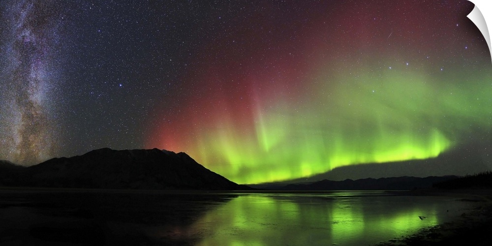 Aurora borealis Milky Way, Big Dipper, and a shooting star above Kluane Lake, Yukon, Canada.