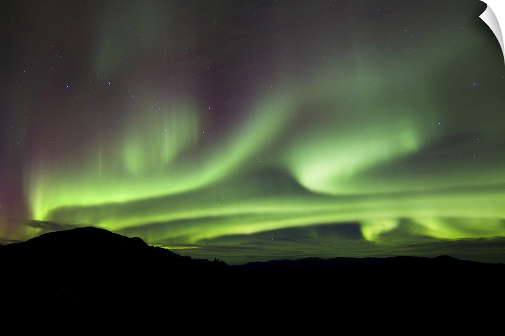 Aurora borealis over Gray Peak, Whitehorse, Yukon Canada.