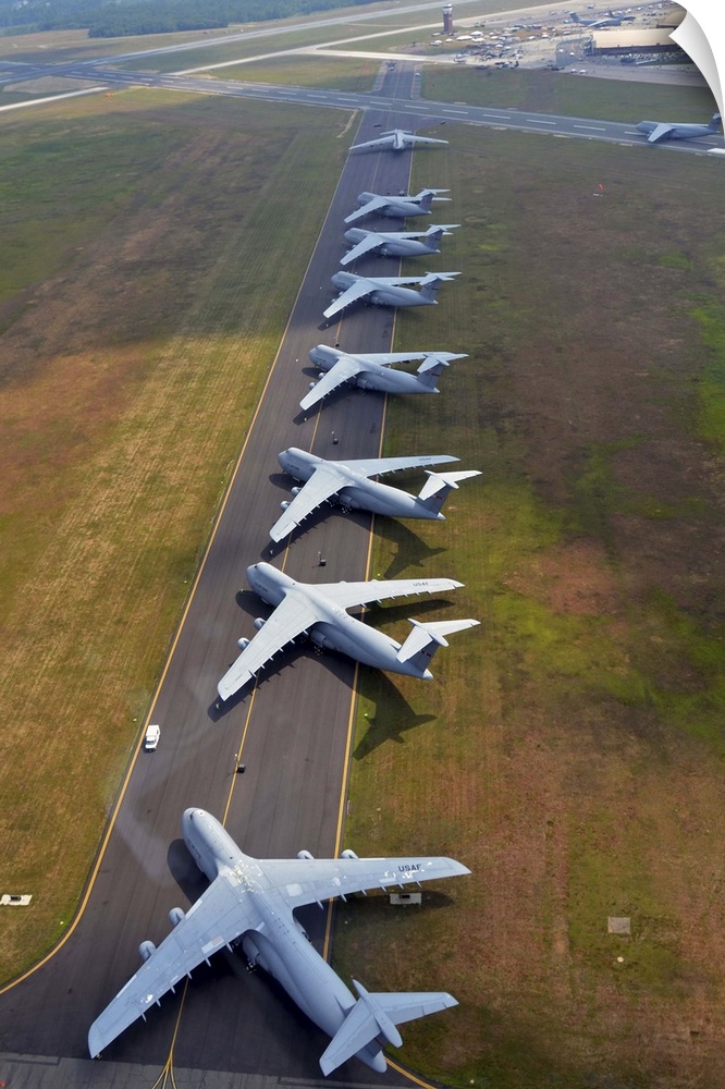 August 4, 2012 - C-5 Galaxies align on the runway to make room for air show aircraft at Westover Air Reserve Base, Massach...