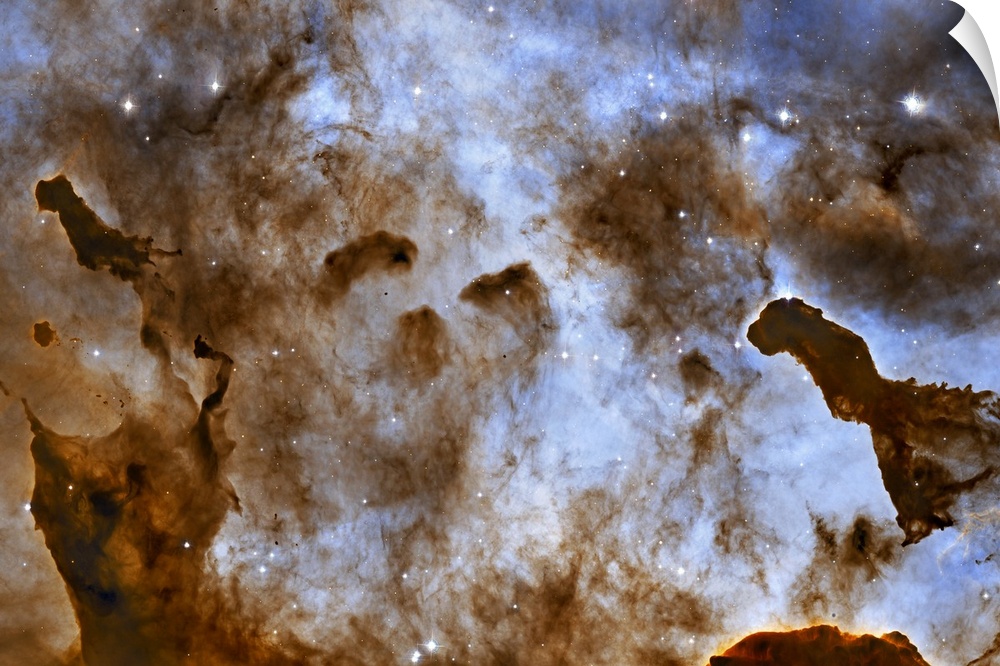 One light-year tall star-forming pillars of cold hydrogen and dust located in the Carina Nebula.  The result is from radia...