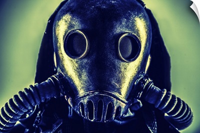 Close-Up Portrait Of Post-Apocalypse Survivor Wearing Rags And Full-Face Gas Mask