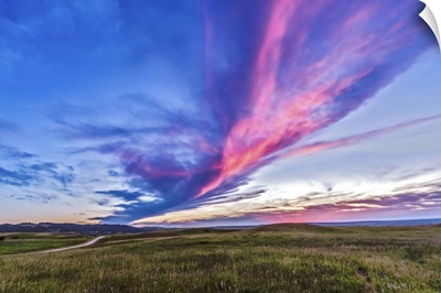 Colorful sunset at the Reesor Ranch on the Alberta-Saskatchewan border