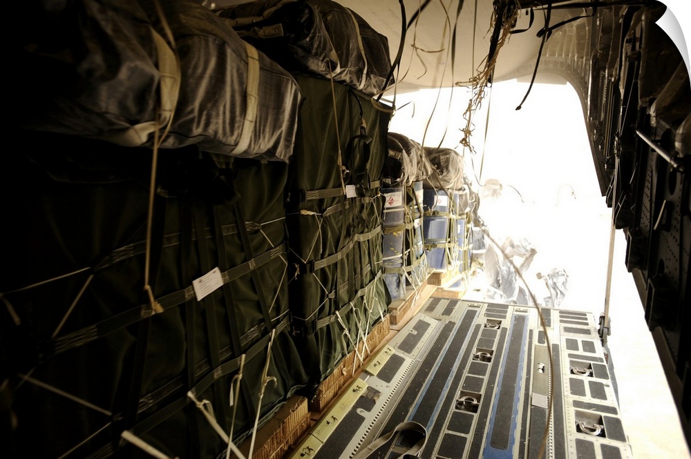 May 9, 2010 - In less than thirty seconds, 40 container delivery system bundles totaling 70,000 pounds drop out of a C-17 ...