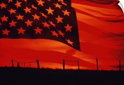 Digital Composite Of The American Flag Over The Countryside