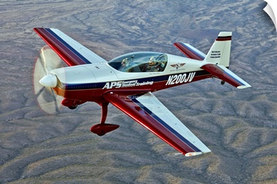 Extra 300 aerobatic aircraft over Mesa, Arizona