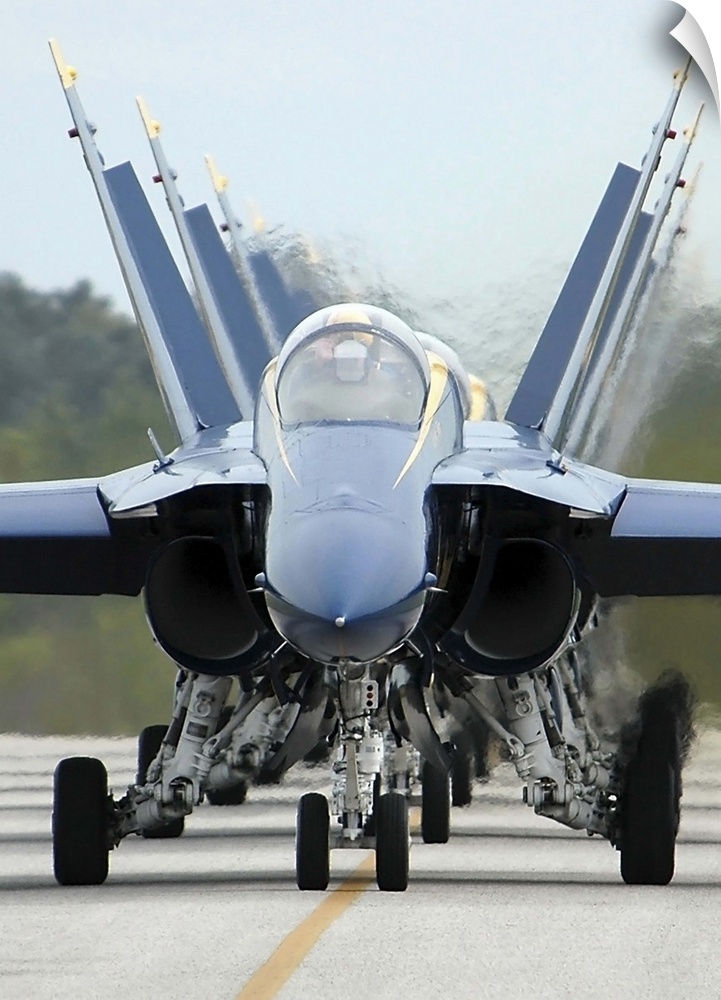 F/A-18A Hornets assigned to the Blue Angels, taxi back to their flight line.