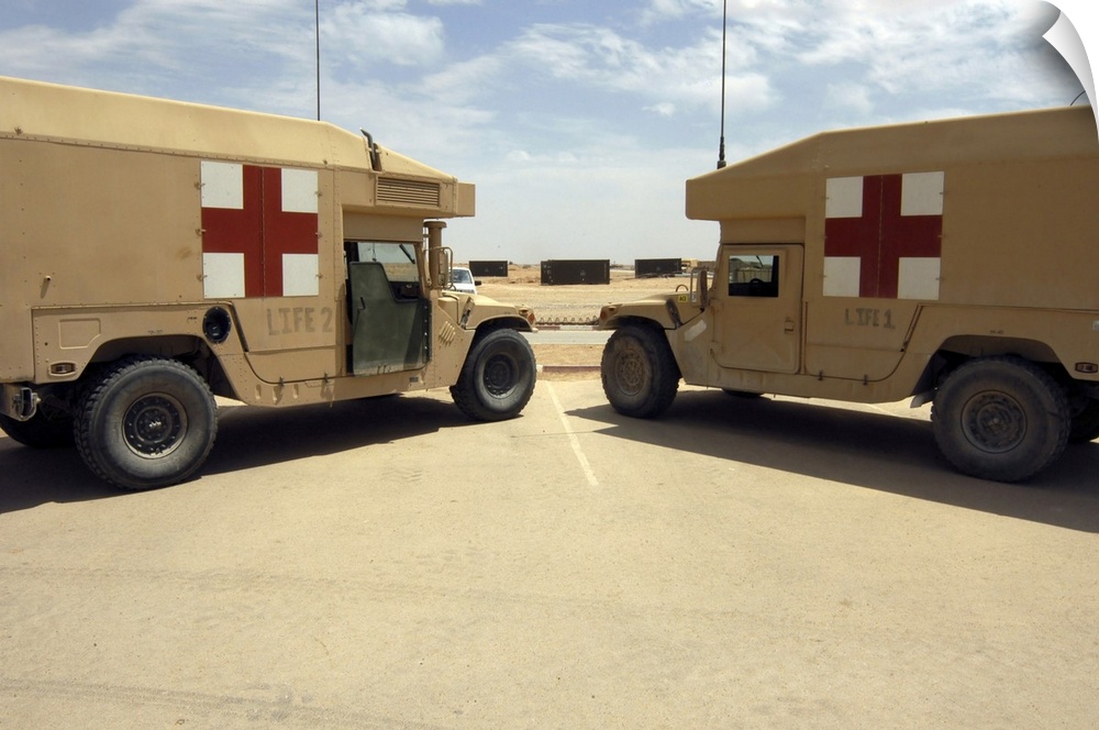Al Asad, Iraq -LIFE 1 and LIFE 2 field ambulances sit ready if the call comes to deliver injured persons to departing airc...