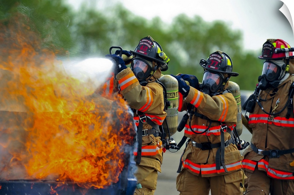 August 5, 2014 - Firefighters put out a fire during an exercise on Minot Air Force Base, North Dakota. The exercise focuse...