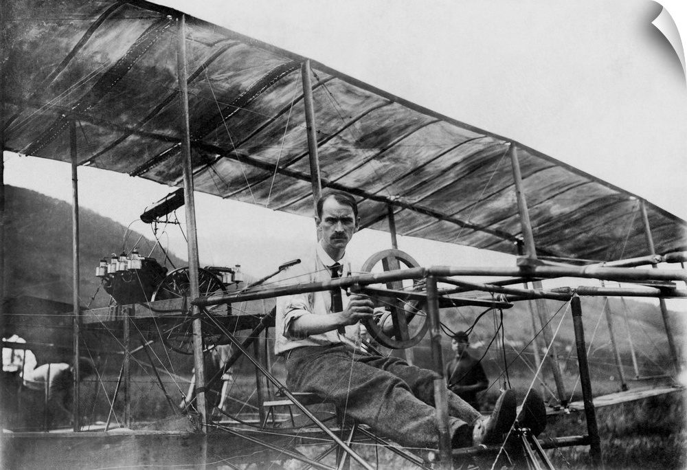American history photo of Glenn Curtiss, the founder of the aircraft industry in the United States, in his biplane. He sta...