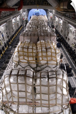 Humanitarian Aid Loaded By Hawaii Air National Guard Into A C-17 Globemaster III