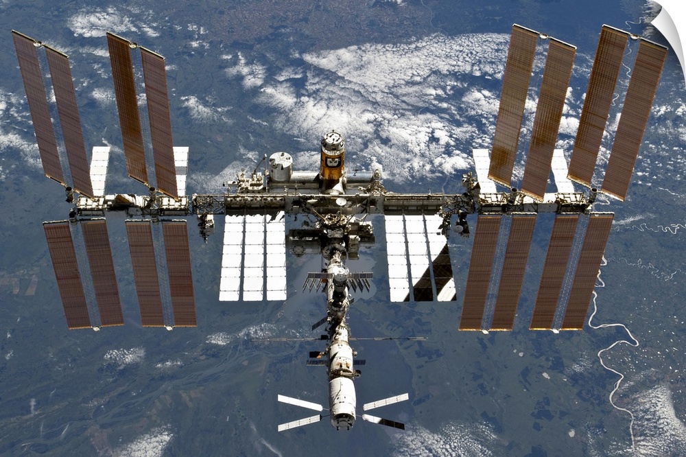 March 7, 2011 - The International Space Station backgropped by a blue and white Earth.