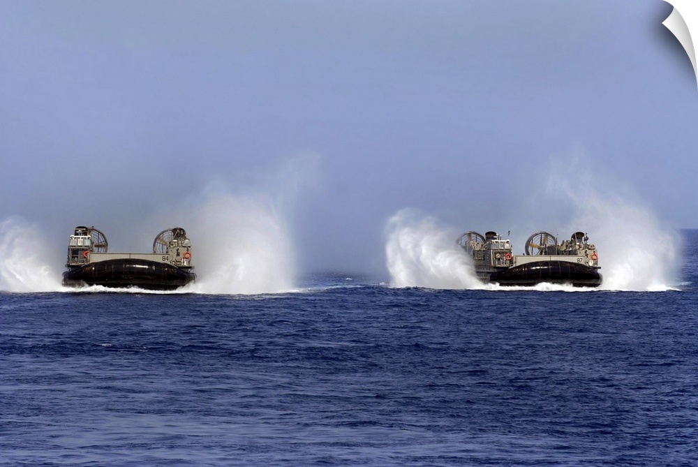 April 15, 2010 - Landing Craft Air Cushion 84 and 87, both assigned to Assault Craft Unit Four, conduct operations in the ...