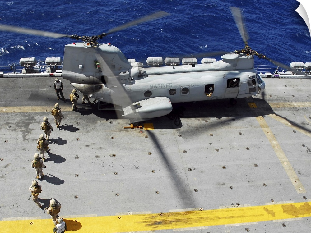 Pacific Ocean, October 21, 2008 -Marines load into a CH-46E Sea Knight helicopter for a fast-rope training exercise onto t...