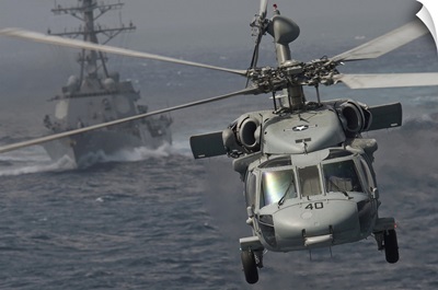 N MH-60S Knight Hawk Delivers Supplies To USS Carl Vinson