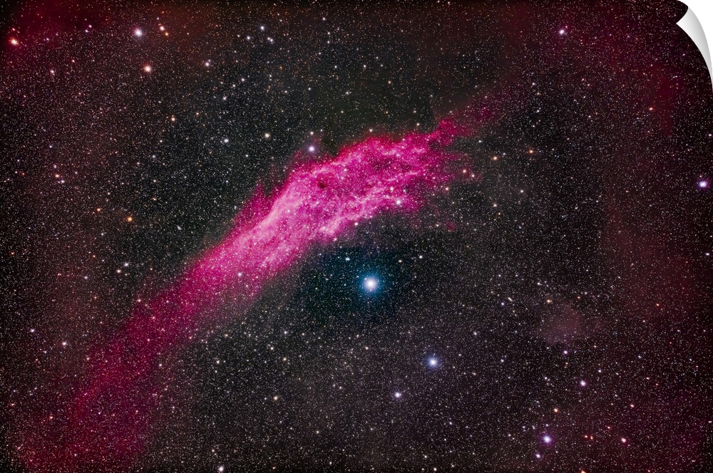 NGC 1499, the California Nebula, in Perseus. This visually faint emission nebula shines above the hot blue star Zeta Perse...