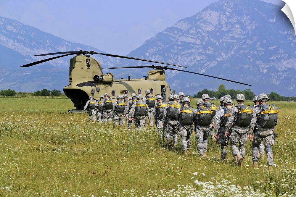 July 16, 2013 - Paratroopers participate in a joint parachute training jump with CH-47 Chinook aircraft.