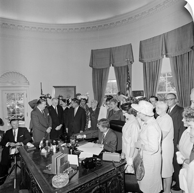 President John F. Kennedy signing the Equal Pay Act