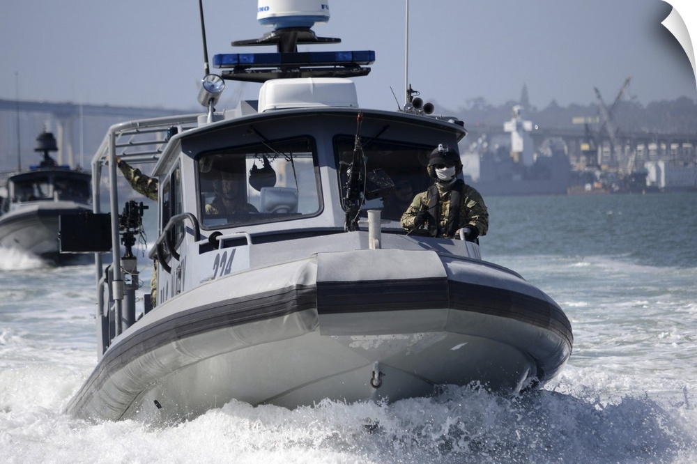 San Diego, California, May 14, 2013 - Sailors conduct training in small boat defensive tactics in San Diego Bay. The Coast...