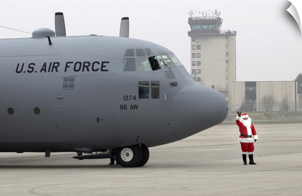 Ramstein Air Base, Germany, December 12, 2004 - Santa arrives by a C-130 Hercules.