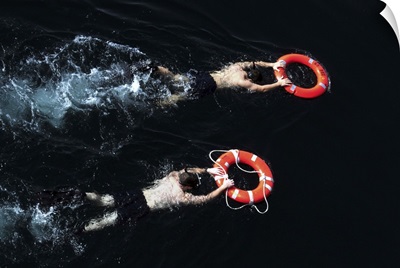 Search And Rescue Swimmers During A Swim Call