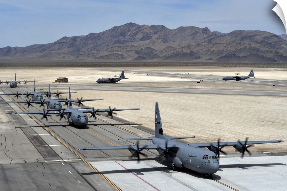 June 21, 2014 - Seven C-130J Super Hercules taxi after landing during the Joint Forcible Entry exercise on Creech Air Forc...