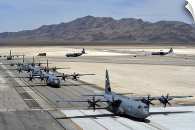 Seven C-130J Super Hercules taxiing at Creech Air Force Base