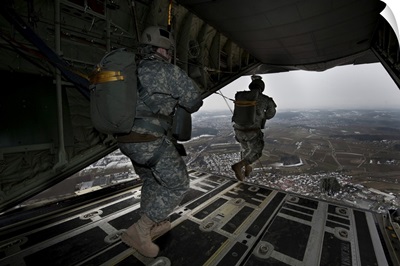 Soldiers Jump From A C-130 Aircraft Over Germany