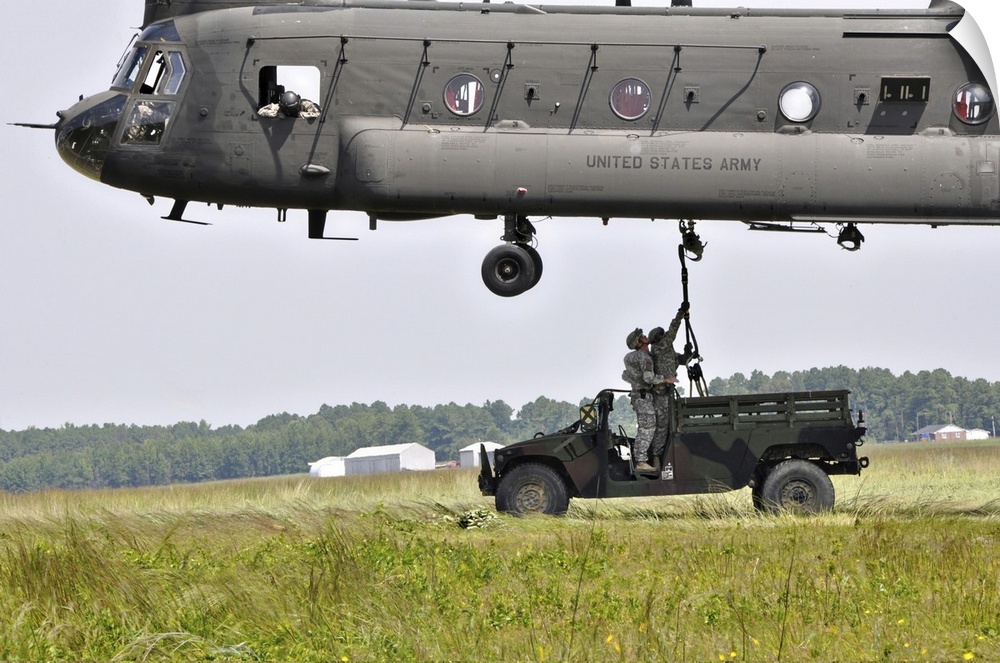 August 19, 2011 - Soldiers from the Fort Benning-based Warrior Training Center teach students sling load operations on a C...