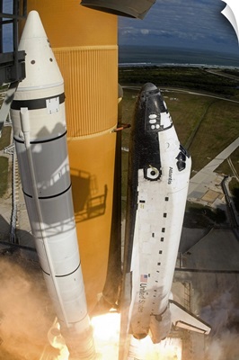 Space Shuttle Atlantis lifts off from its launch pad at Kennedy Space Center Florida