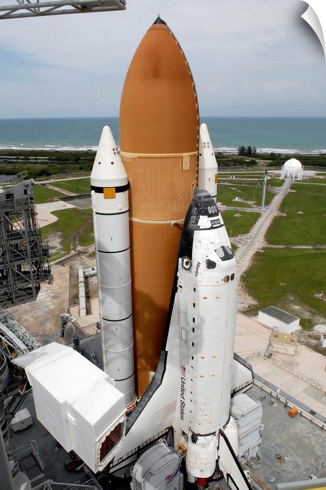 Space shuttle Atlantis sits on the top of Launch Pad 39A at Kennedy Space Center