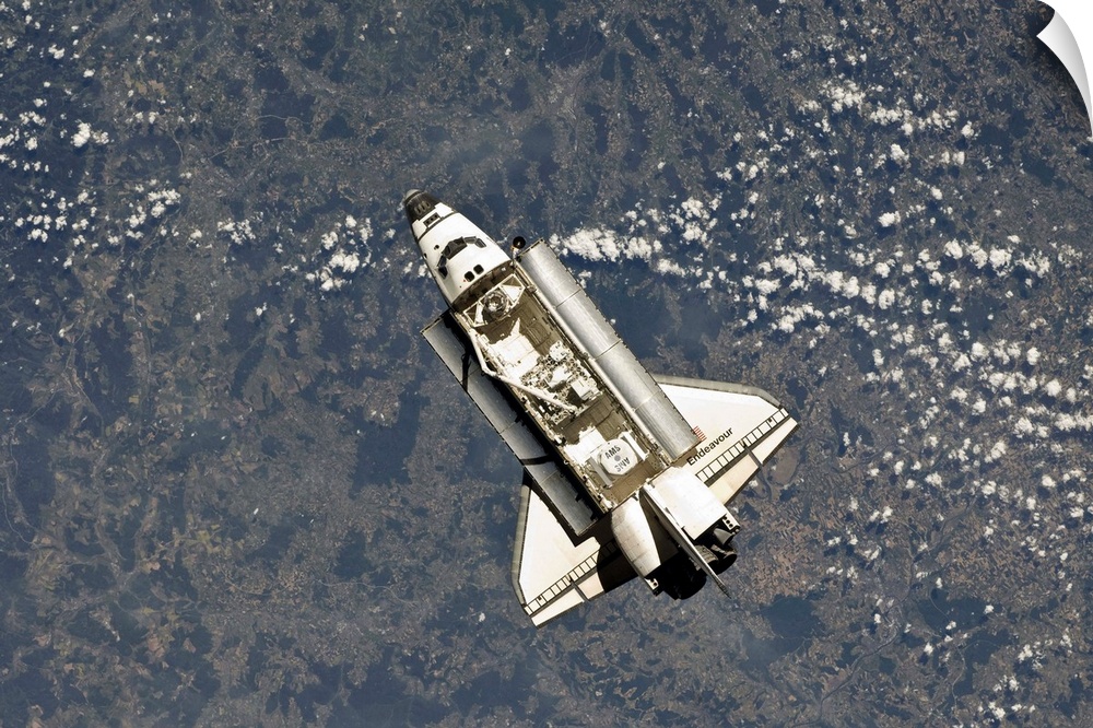 May 18, 2011 - Space shuttle Endeavour backdropped by a colorful Earth.