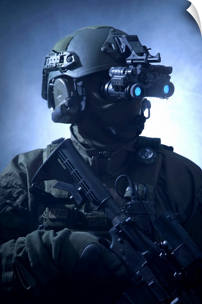 Special operations forces soldier equipped with night vision and an automatic weapon.