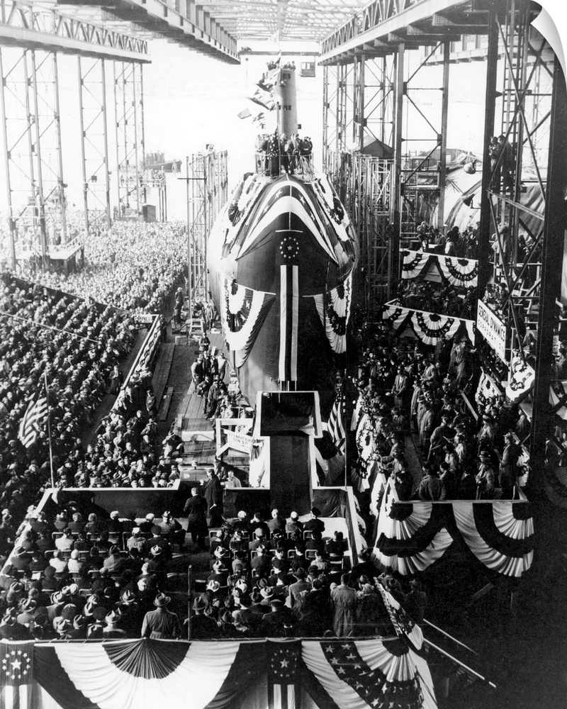 January 21, 1954 - Spectators gather around the nuclear-powered submarine USS Nautilus (SSN 571) during a christening cere...