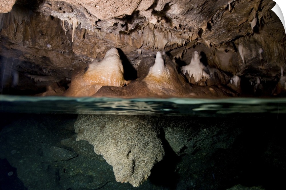 Split shot of stalactites and stalagmites in a cave, Australia.