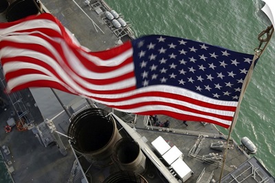 Stars and Stripes flying boldly, seen from the crow's nest aboard USS Donald Cook