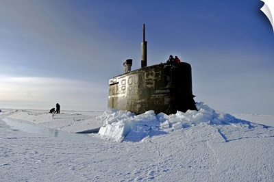 Submarine USS Connecticut surfaces above the ice
