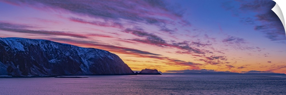 Sunset at the north end of Norway as we sailed past the sea cliffs of Finnkirka out of Honnigvag and North Cape.