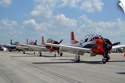 T-28C Trojan aircraft lined up on the flight line