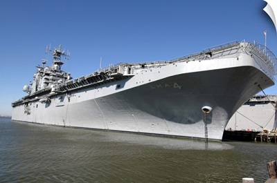 The Amphibious Assault Ship USS Nassau Sits Moored In Port