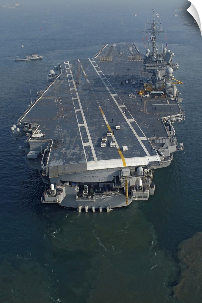 The conventionally powered aircraft carrier USS Kitty Hawk