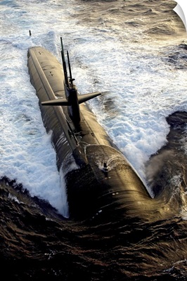 The Los Angelesclass submarine USS Albuquerque surfaces in the Atlantic Ocean