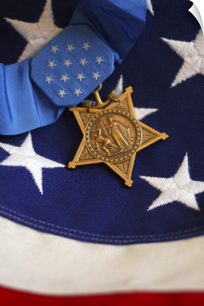 The Medal of Honor rests on a flag during preparations for an award ceremony.