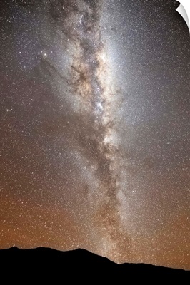 The Milky Way in vertical position rising from the horizon