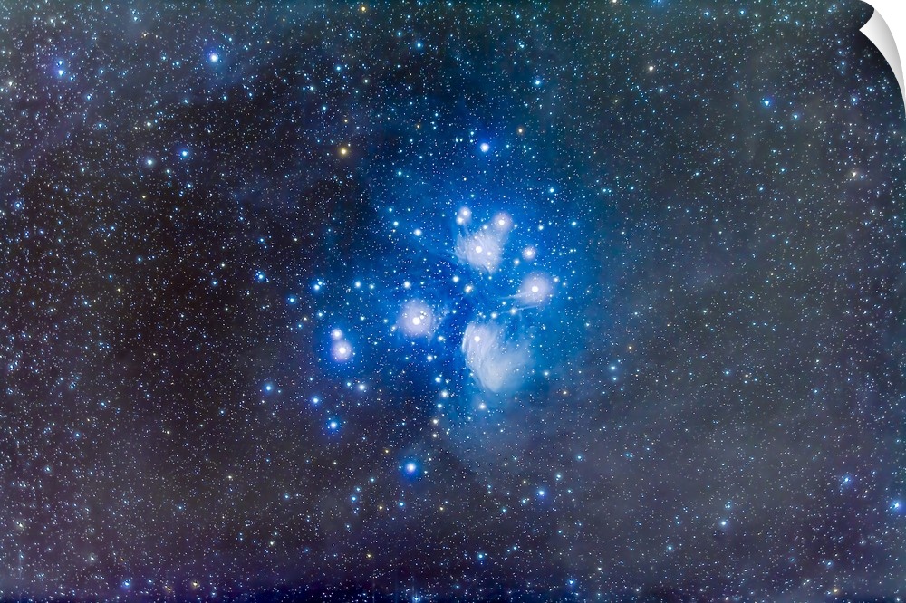 The Pleiades star cluster, or Seven Sisters, aka Messier 45, in Taurus. The brightest part of the reflection nebula around...